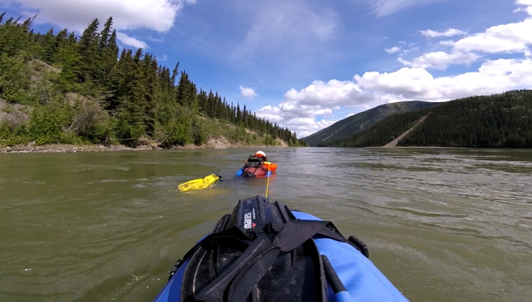 Denis Morin swam, with a riverboard, from Whitehorse, Yukon, to Emmonak, Alaska, between May 25 and Aug. 9 2016. This image is made from a GoPro mounted to his cargo. As Morin swam the upper reaches of the Yukon River, he towed his camp, food and other supplies. (Denis Morin)
